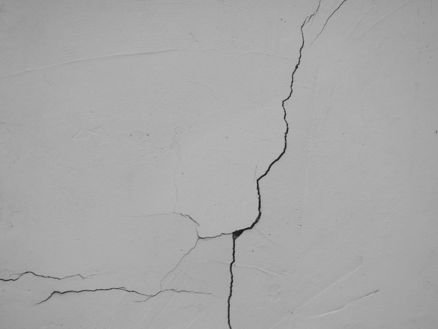 Hairline crack in fresh wall plaster