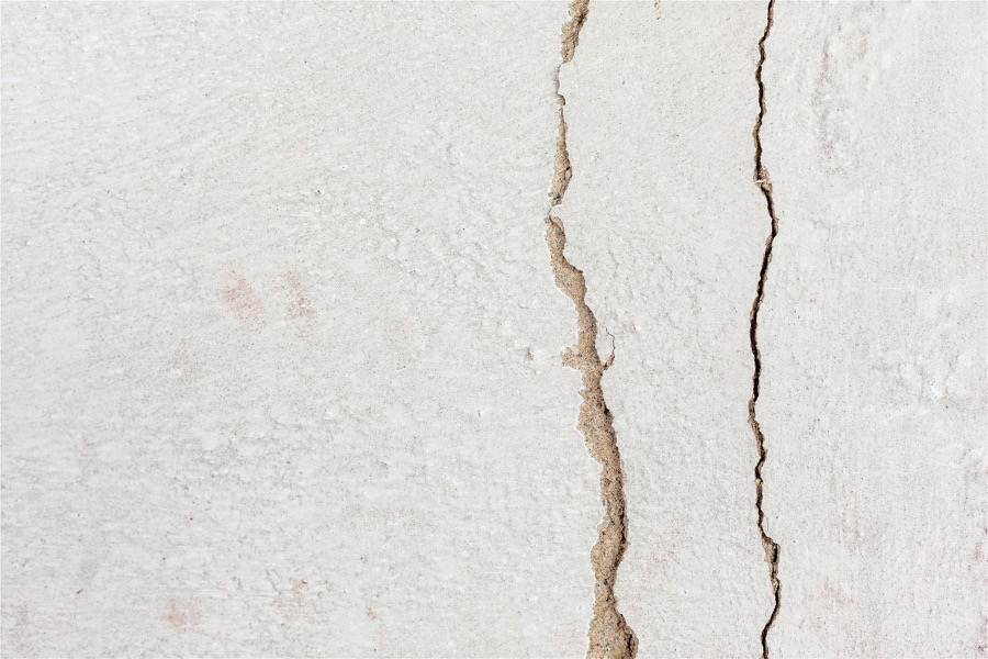 Vertical crack through wall plaster